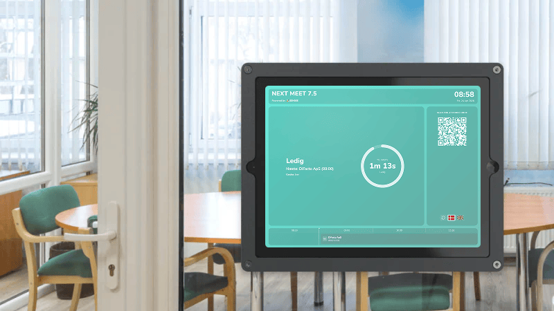 Senbee Planlægning kører på en tablet uden for et mødelokale